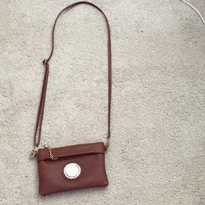 A fancy Michael Kors bag That you can bring out to dinner